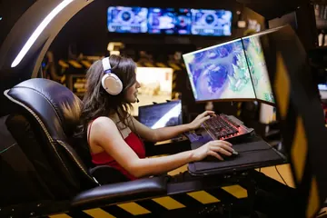 Pro esports gaming setup showing an FPS aim reticle on a high-refresh-rate monitor