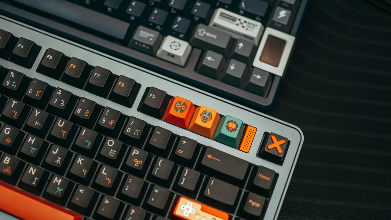 Mechanical keyboards on a desk for keyboard polling rate and input latency testing