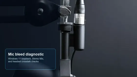 Studio microphone setup used to diagnose Windows 11 desktop audio bleeding into microphone input