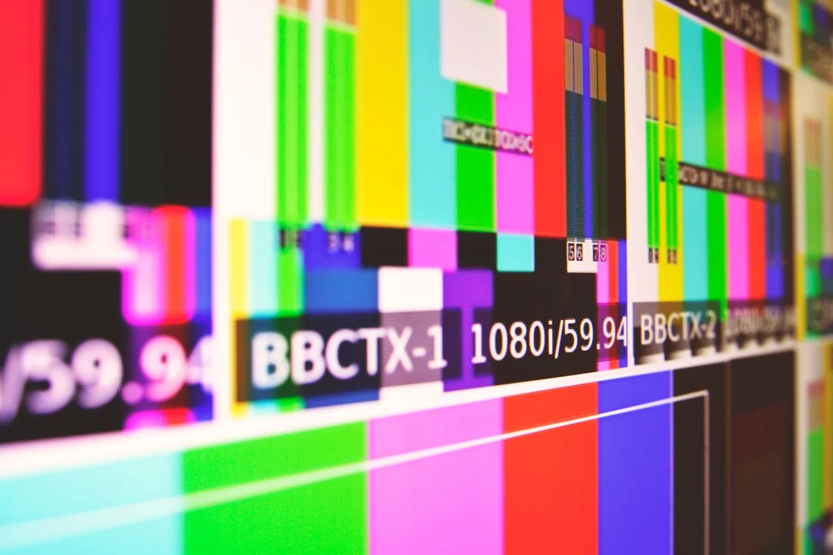Color test bars on a display used to spot chroma subsampling and cable-bandwidth fuzz on colored text