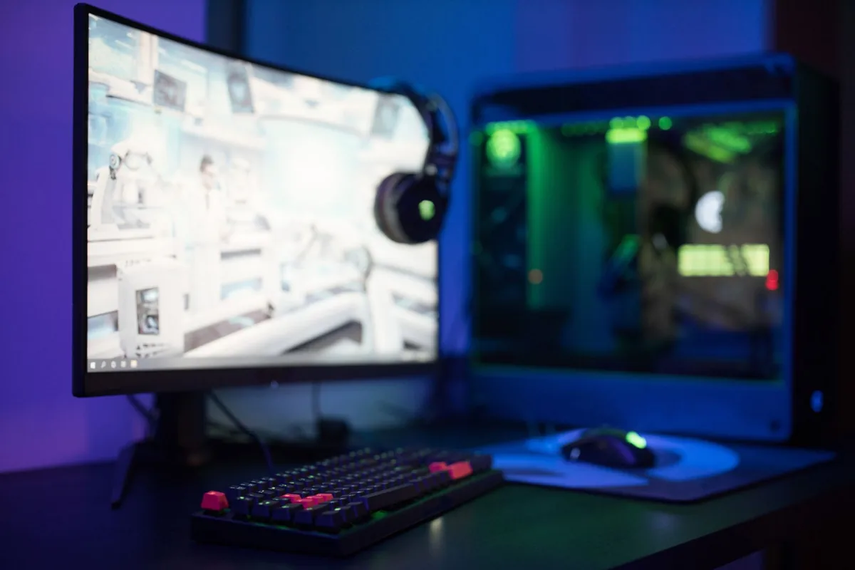 Curved computer monitor on a desk showing how a non-native resolution can make the whole screen look soft