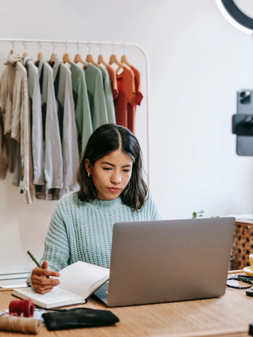 Publisher working at a home desk while documenting an advertising migration