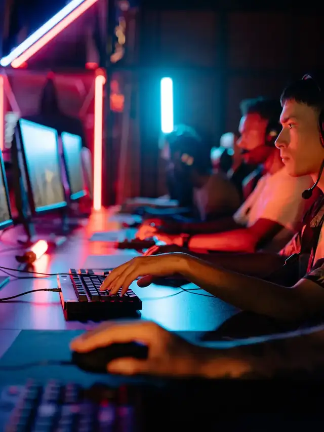 Group of esports players using keyboards during a competitive match