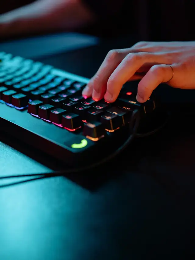 A hand pressing keys on a generic mechanical keyboard; stock illustration of checking received key presses and releases
